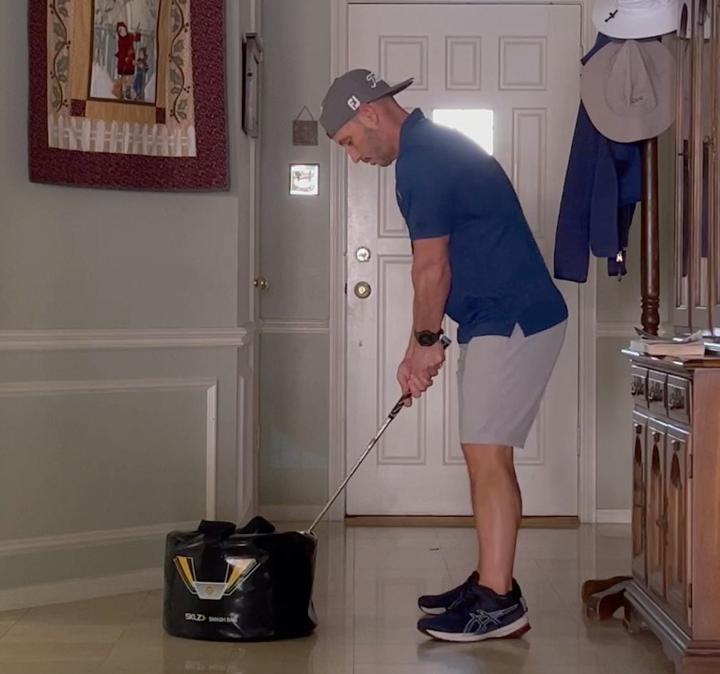 Impact bag drill - address position down the line face on Impact bag drill - address position down the line face on
