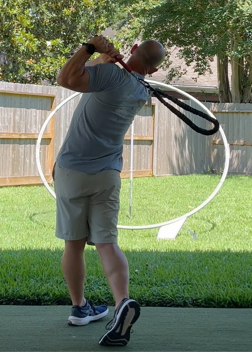 Golfer-Geek-Impact-Sling-in-Follow-Through